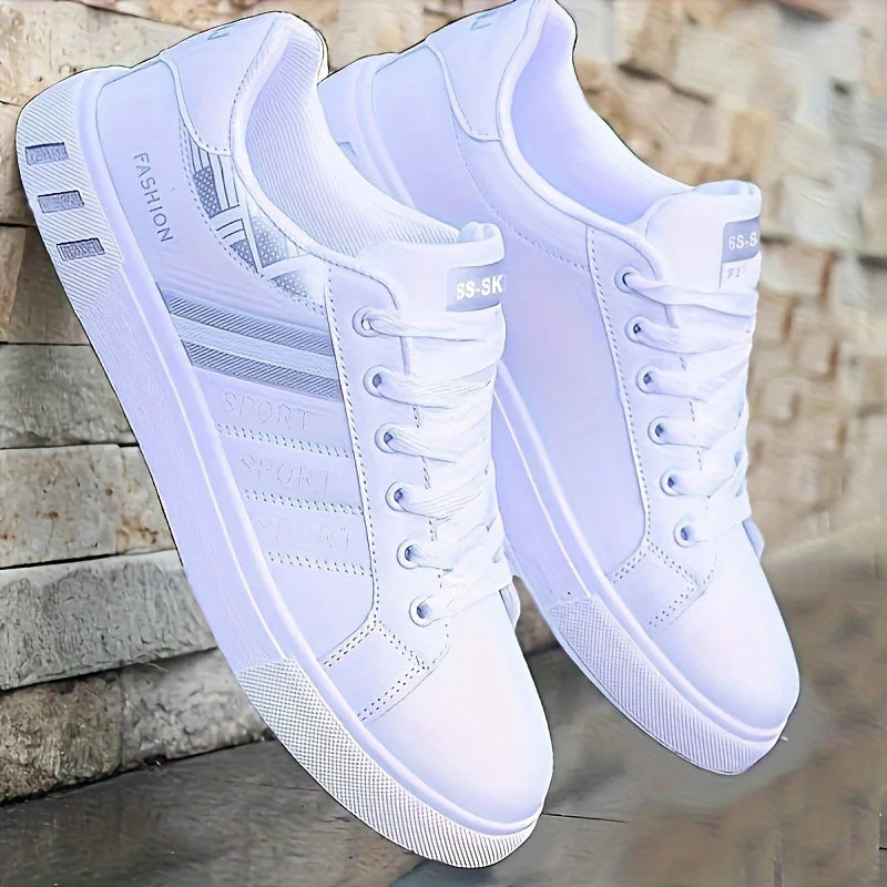 A Pair of White Sneakers, Perfect for Skateboarding