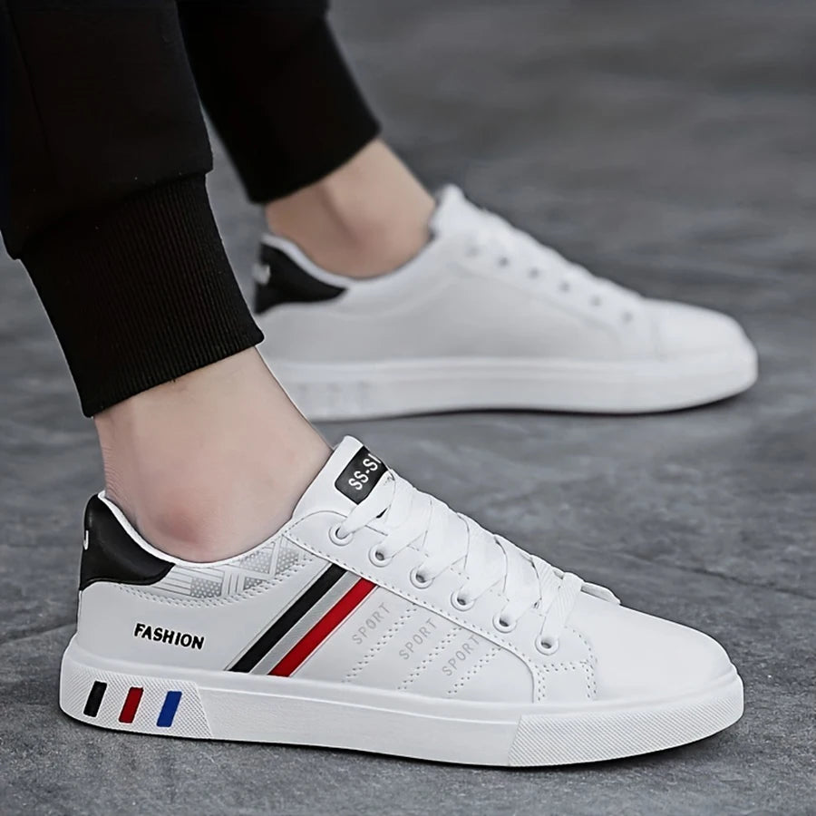 A Pair of White Sneakers, Perfect for Skateboarding